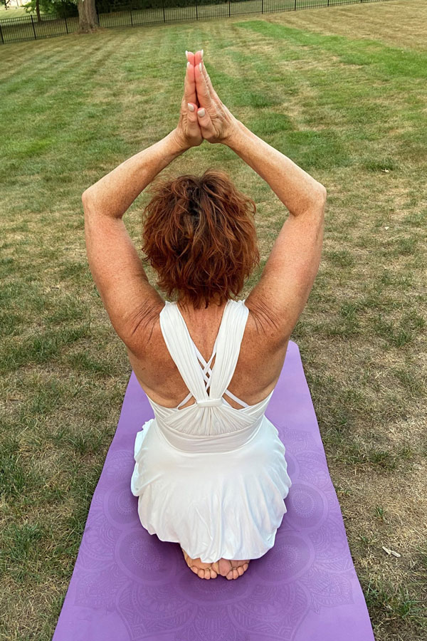 Virasana-w-anjali-mudra-over-head